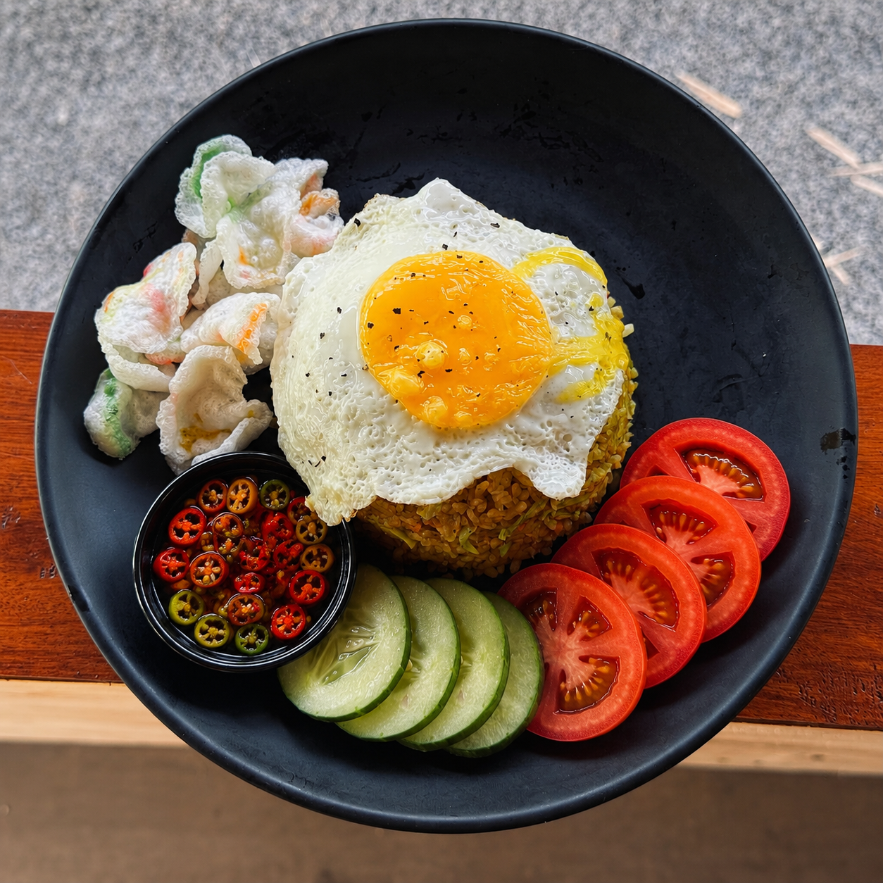 Nasi goreng with egg, tomatoes and chilli