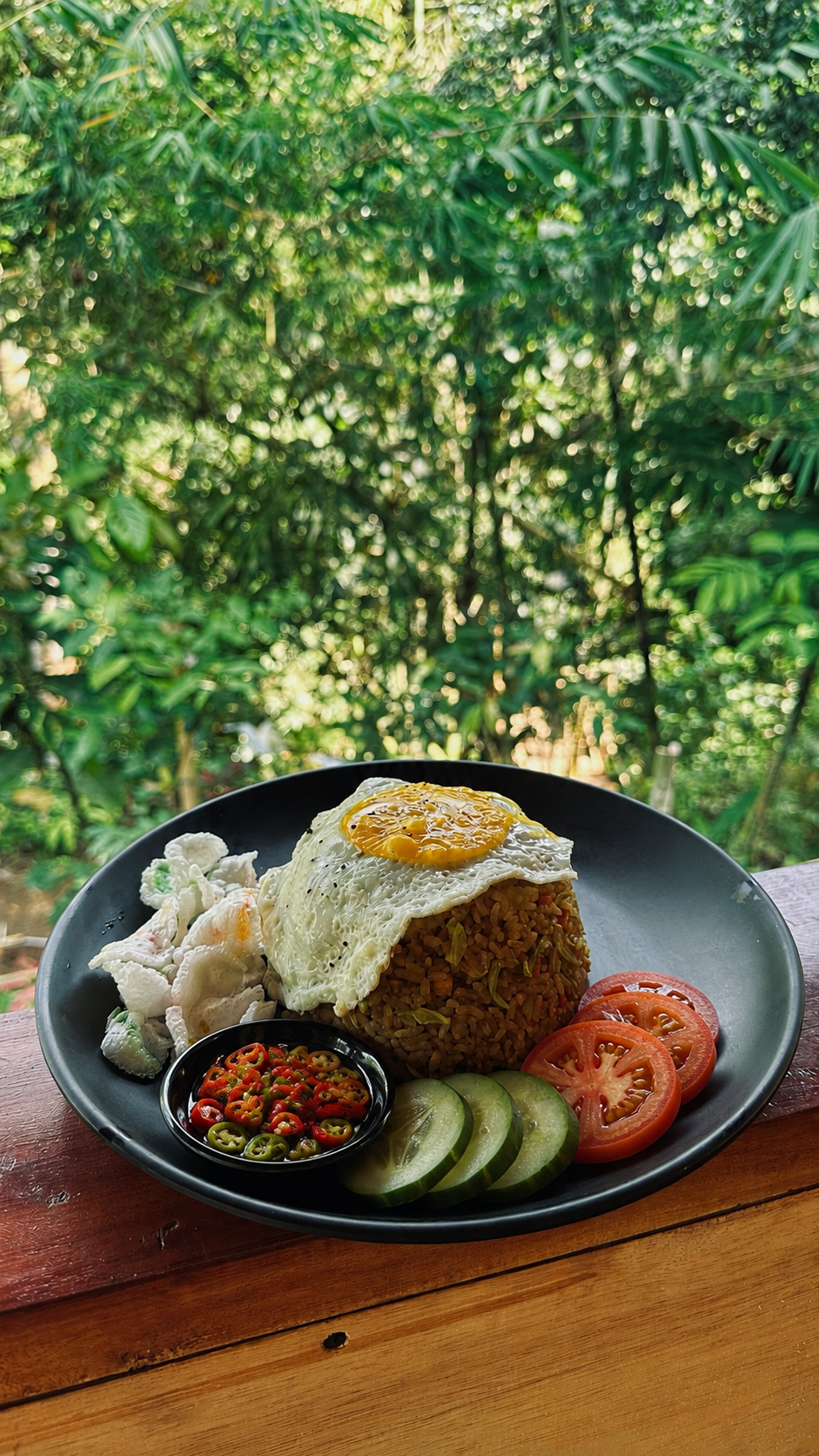 Indonesian fried rice with bamboo backdrop
